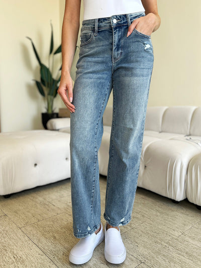 Judy Blue Full Size Mid Rise Distressed Straight Jeans with pocket and distressed detailing.