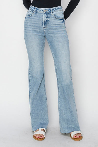 RISEN high rise raw cut hem bootcut jeans in light wash.