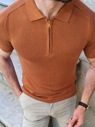 Men's collared neck quarter zip knit polo shirt in rust color with short sleeves and slight stretch fabric.