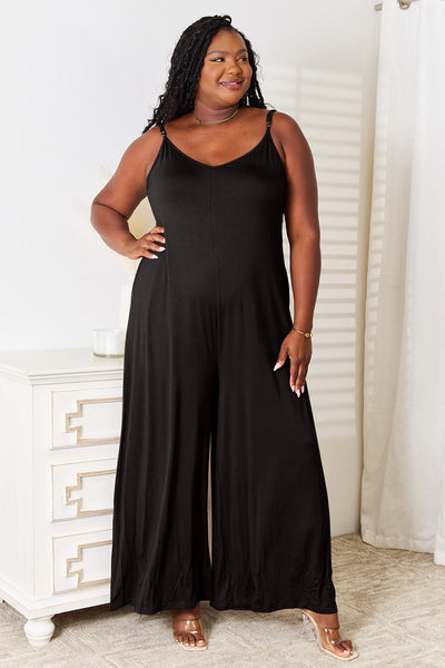 Double Take Full Size Soft Rayon Spaghetti Strap Tied Wide Leg JumpsuiThis spaghetti strap tied wide-leg jumpsuit is a modern and trendy choice for any occasion. Its wide-leg design and spaghetti straps create a flattering silhouette, DressesFull Size Soft Rayon Spaghetti Strap Tied Wide Leg Jumpsuit