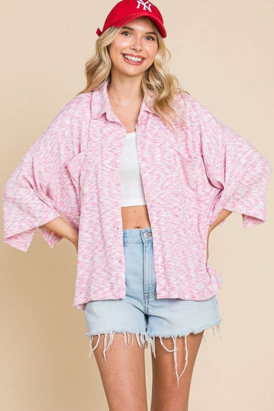 Drop shoulder slit shirt in pink with button-up front and relaxed fit.