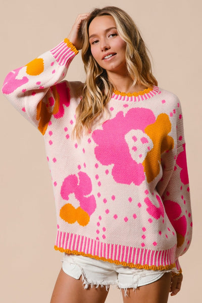 BiBi Flower Pattern Contrast Sweater with bright floral design, pink and yellow accents.