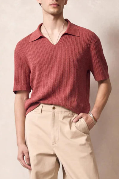 Men's plus size Johnny collar half sleeve knit polo shirt in rust color with moderate stretch, paired with beige pants