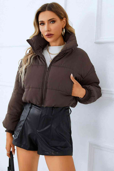 Zip-Up Winter Coat with PocketsFeatures: Pocketed
Thickness: Thick
Body: Lined
Material composition: 95% polyester, 5% cotton
Care instructions: Hand wash cold. Do not tumble dry.
Imported
ProductOuterwearWinter Coat