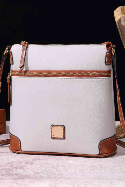 PU Leather Crossbody BagBag size: Medium
Material: PU, polyester
Imported
Product measurements: 9.8*3.9*9.4 inAccessoriesPU Leather Crossbody Bag