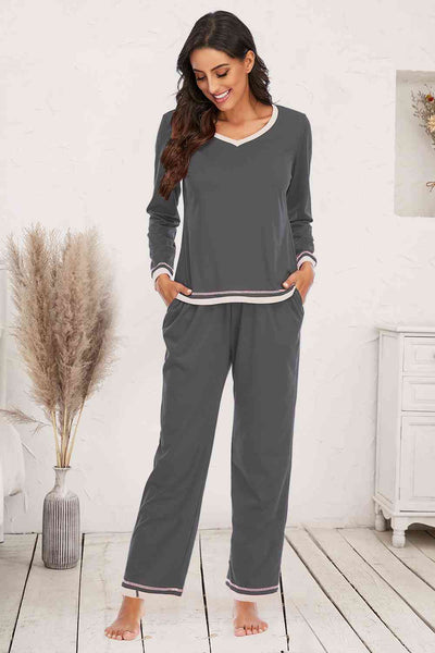 V-Neck Top and Pants Lounge SetFeatures: Pocketed
Number of pieces: Two-piece
Sheer: Opaque
Stretch: Slightly stretchy
Material composition: 35% polyester, 65% cotton
Care instructions: Machine waloungewearPants Lounge Set