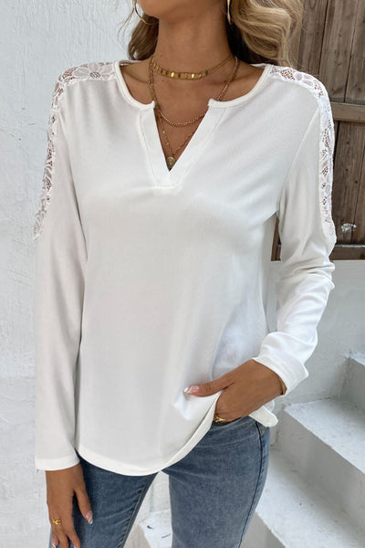 Spliced lace notched neck top with long sleeves, solid casual chic style.