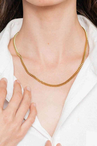 18K Gold Plated Curb Chain Necklace on woman wearing white shirt