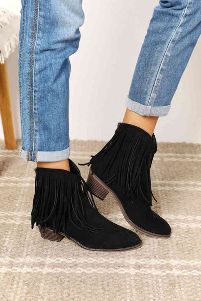 Legend Women's Fringe Cowboy Western Ankle BootsDiscover these ankle boots. Embellished with stylish fringe detailing, these boots capture the essence of cowboy-inspired fashion. The ankle-height design adds a modShoesFringe Cowboy Western Ankle Boots