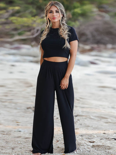 Short Sleeve T-Shirt and Wide Leg Pants SetFeatures: Pocketed
Number of pieces: Two-piece
Stretch: Moderate stretch
Material composition: 65% cotton, 35% polyester
Care instructions: Machine wash cold. TumbleloungewearWide Leg Pants Set