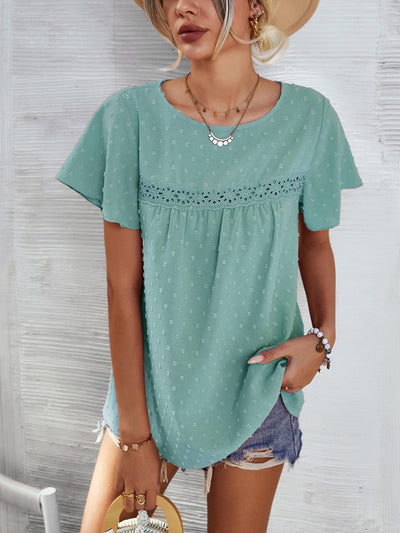 Lace detail round neck short sleeve blouse in light green.