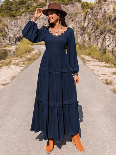 Long Sleeve Lace Trim Maxi Dress in navy with lace detail, worn by model outdoors.