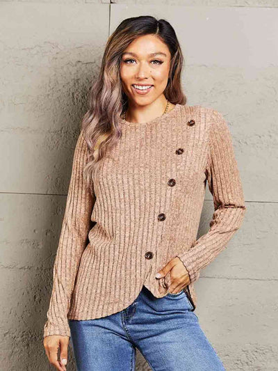 Double Take Ribbed Round Neck Buttoned Long Sleeve TeePattern type: Solid
Style: Casual
Features: Buttoned, Asymmetrical
Neckline: Round neck
Length: Regular
Sleeve length: Long sleeves
Sleeve type: Regular sleeves
SheeTopsRibbed Round Neck Buttoned Long Sleeve Tee