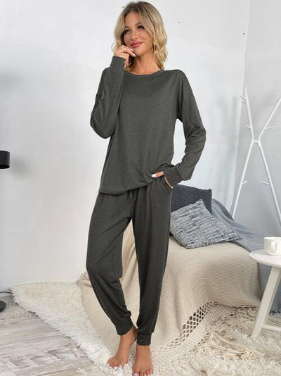 Round Neck Top and Drawstring Pants Lounge SetFeatures: Basic style
Number of pieces: Two-piece
Stretch: No stretch
Material composition: 95% polyester, 5% spandex
Care instructions: Machine wash cold. Tumble drloungewearDrawstring Pants Lounge Set