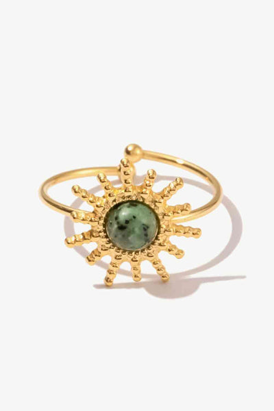 Natural Stone Sun Shape Open Ring in titanium steel with green stone centerpiece.