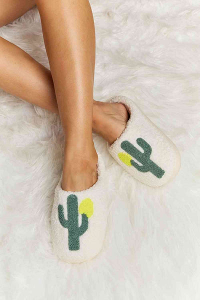 Melody Cactus Plush Slide Slippers with cactus pattern on a soft faux fur material.