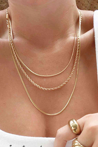 Stainless Steel 18K Gold-Plated Triple Layer Necklace on model.