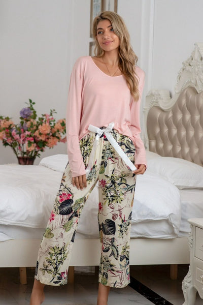 Round Neck Top and Printed Pants Lounge SetFeatures: Basic style
Number of pieces: Two-piece
Sheer: Opaque
Stretch: Slightly stretchy
Material composition: 100% polyester
Care instructions: Machine wash cold.loungewearPrinted Pants Lounge Set